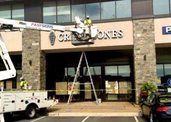 Sign installed at new Crispý Cones sweet shop in Loudoun